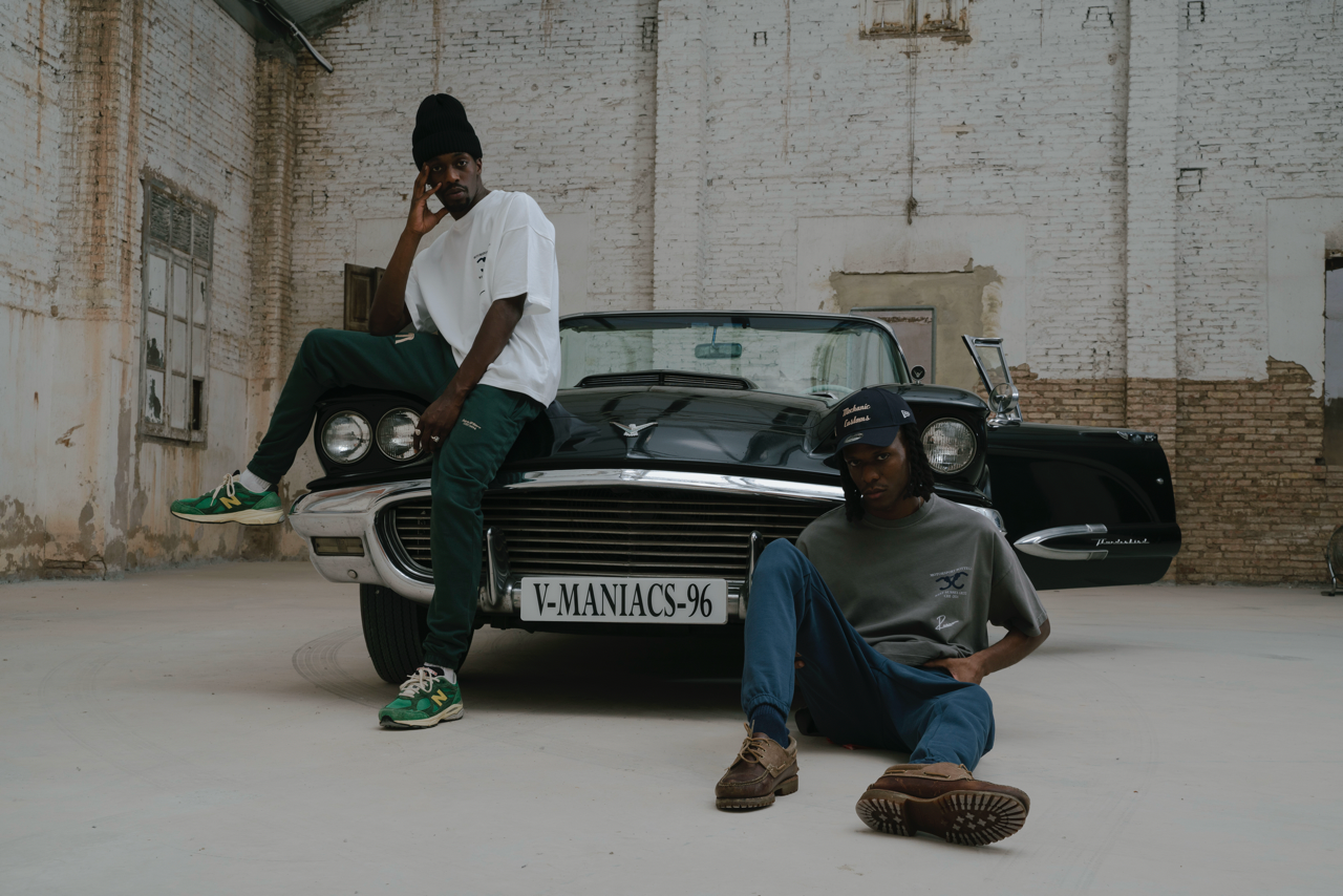A collection of automotive-inspired clothing from Rezmo, featuring stylish apparel like t-shirts, jackets, and accessories designed for car enthusiasts and motorsport fans.